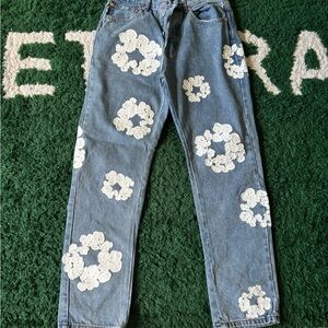 Blue denim tear jeans